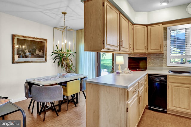 kitchen with light parquet floors, hanging light fixtures, light brown cabinetry, and kitchen peninsula