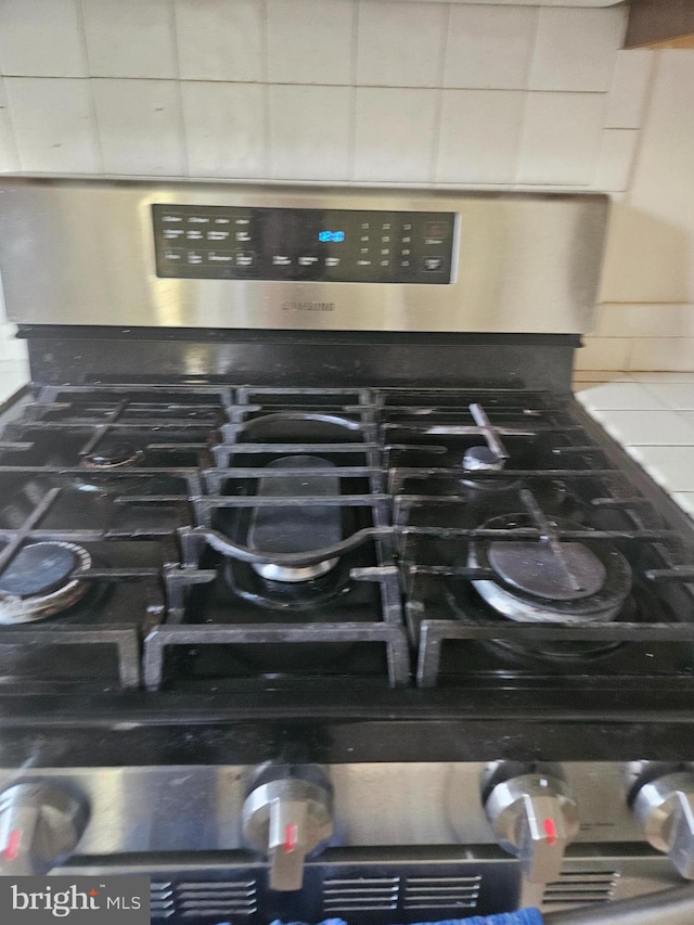 room details featuring stainless steel stove