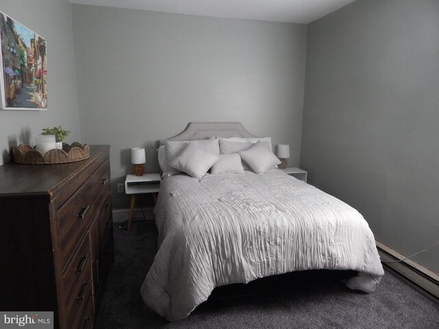 recreation room featuring carpet and baseboard heating