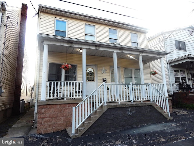 view of front of house with covered porch