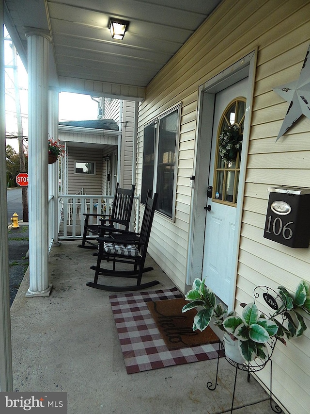 view of patio featuring a porch