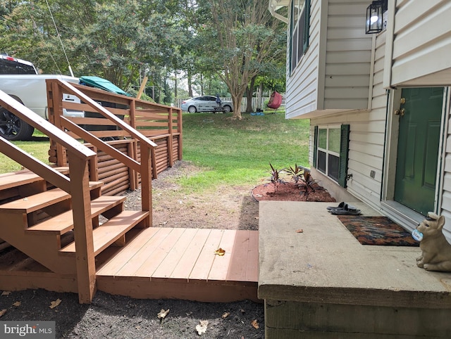 deck featuring a lawn