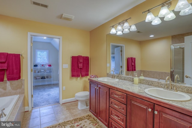 full bathroom with vanity, tile patterned flooring, plus walk in shower, and toilet