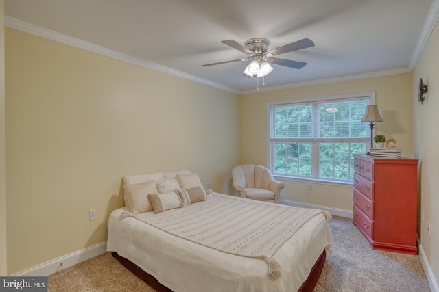 bedroom with ceiling fan, light colored carpet, baseboards, and ornamental molding