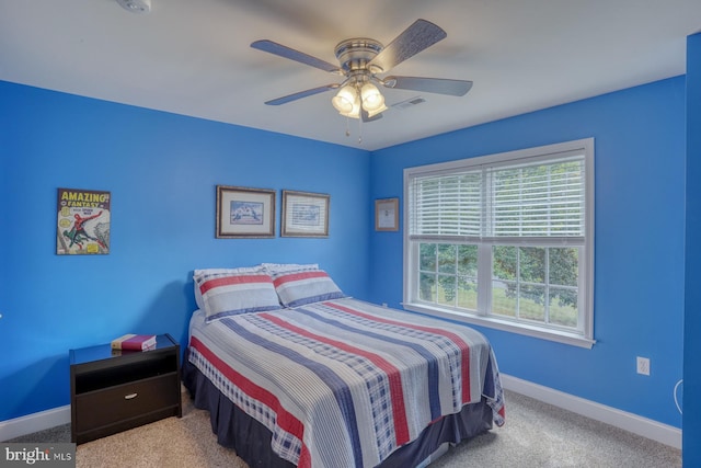 carpeted bedroom with ceiling fan