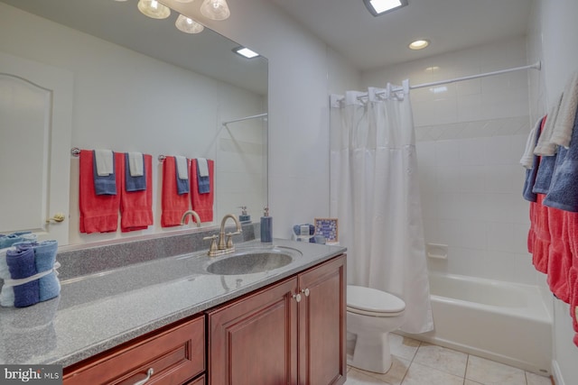 bathroom featuring vanity, tile patterned floors, toilet, and shower / tub combo with curtain