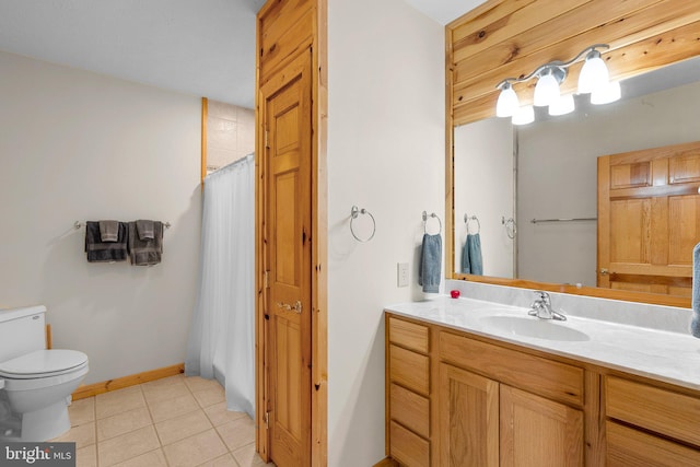 bathroom featuring a shower with curtain, tile patterned flooring, toilet, and vanity