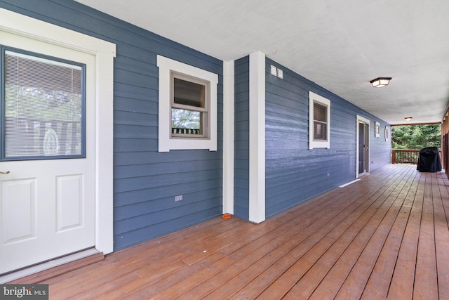 wooden deck with a porch