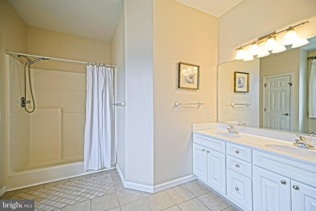 bathroom with shower / bath combo, vanity, and tile patterned floors