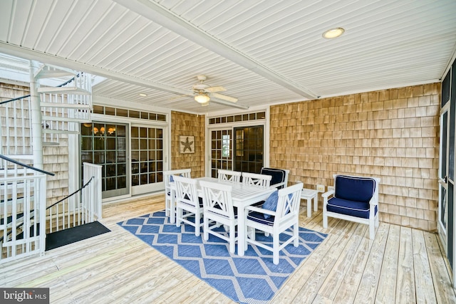 wooden terrace featuring ceiling fan