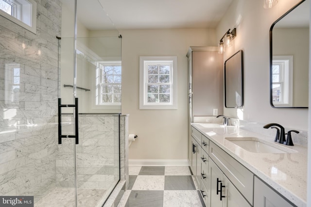 bathroom featuring vanity and walk in shower