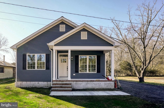 view of front of home with a front yard