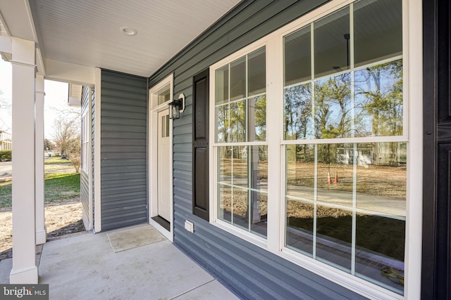 view of patio featuring a porch