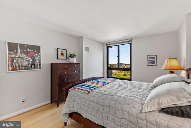 bedroom featuring light hardwood / wood-style floors