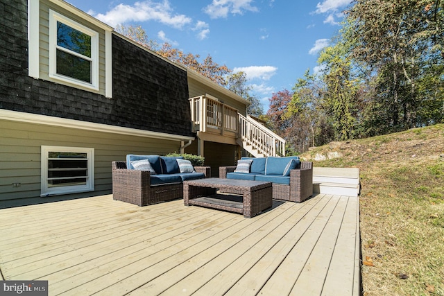 wooden terrace with outdoor lounge area