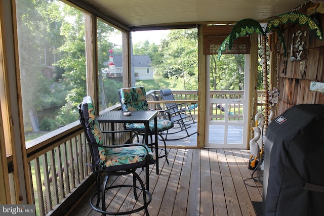 sunroom / solarium featuring a wealth of natural light