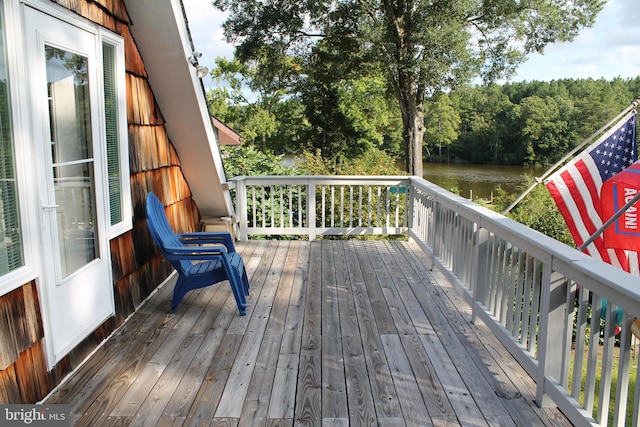 deck featuring a water view