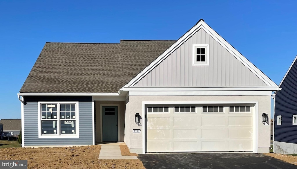 view of front of house with a garage