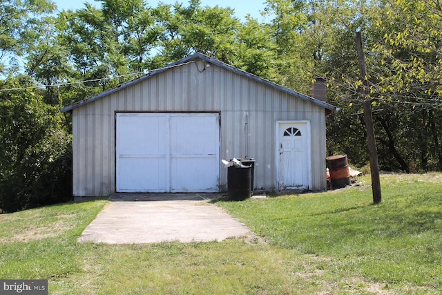 garage with a yard