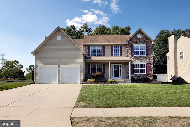 view of front facade with stone siding, an attached garage, concrete driveway, and a front lawn