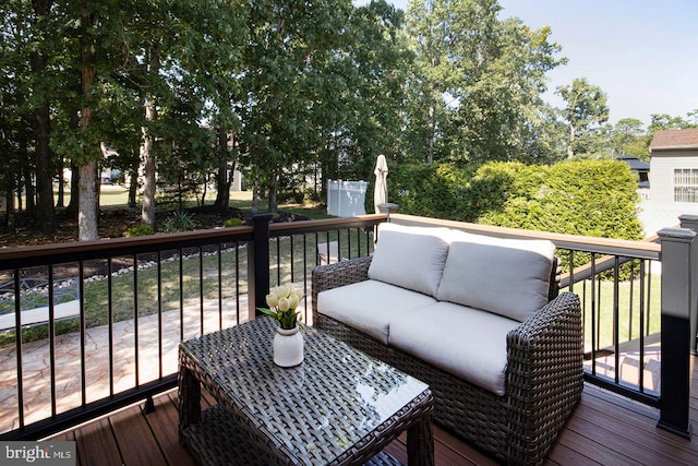 deck with an outdoor hangout area