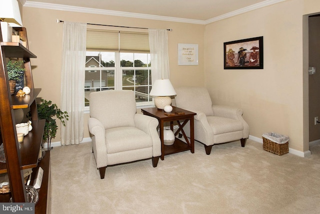 sitting room with light carpet and crown molding