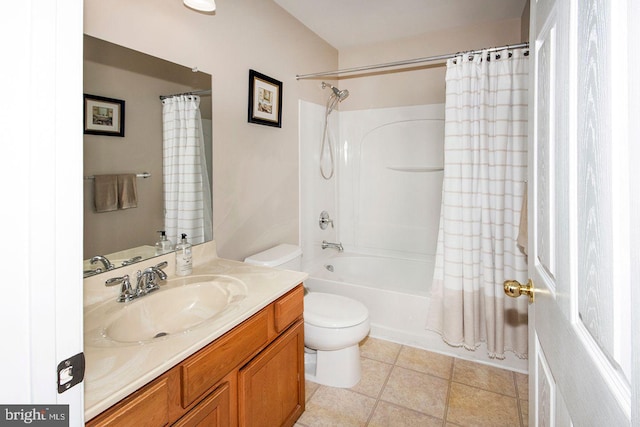 full bathroom featuring shower / bath combination with curtain, tile patterned floors, vanity, and toilet