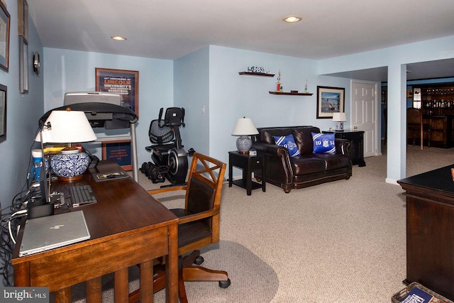 office space with light colored carpet