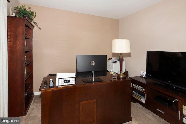 office space with light colored carpet