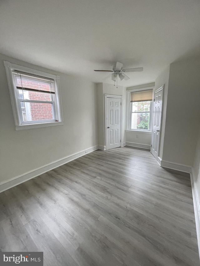 spare room featuring ceiling fan and wood-type flooring