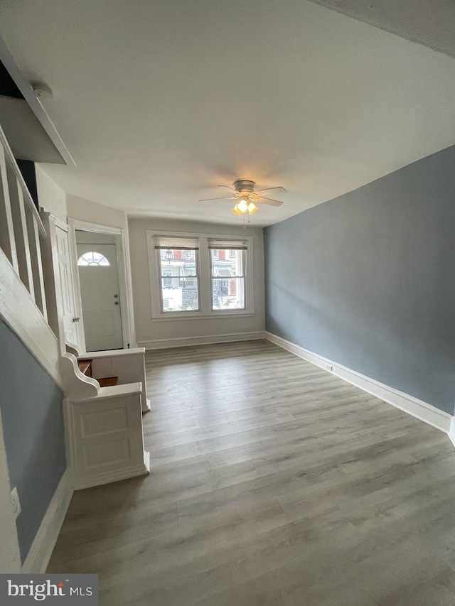 interior space featuring ceiling fan and hardwood / wood-style floors