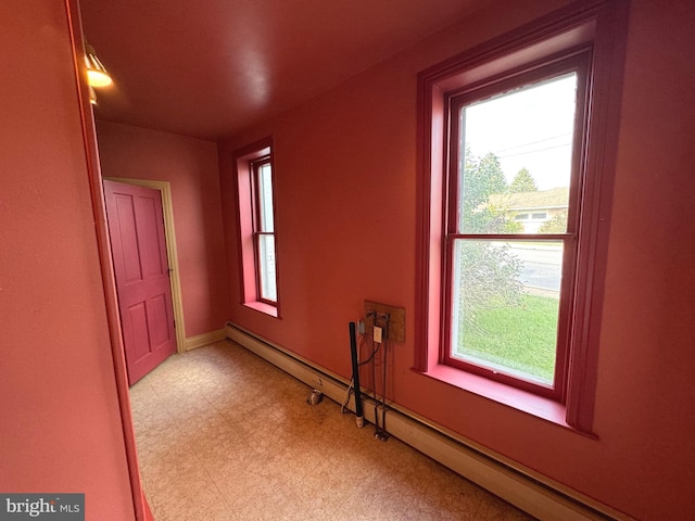 hallway with a baseboard radiator