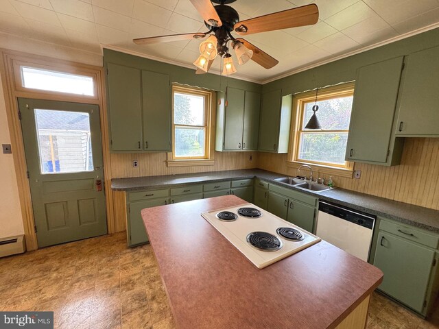 kitchen featuring ceiling fan, plenty of natural light, sink, and white appliances