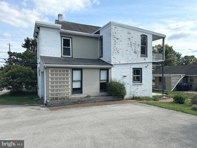 view of property featuring a balcony