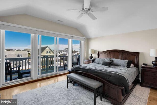 interior space featuring hardwood / wood-style flooring, sink, dark brown cabinets, beverage cooler, and ceiling fan