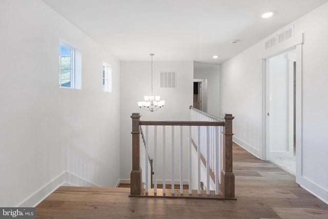 1333 German Driveway, Hanover, MD 21076 - hallway with a chandelier, an upstairs landing, wood finished floors, and recessed lighting