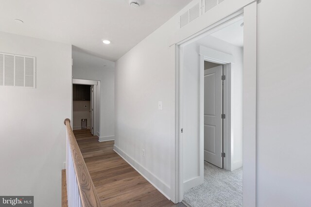 1333 German Driveway, Hanover, MD 21076 - hall featuring an upstairs landing, recessed lighting, and wood finished floors