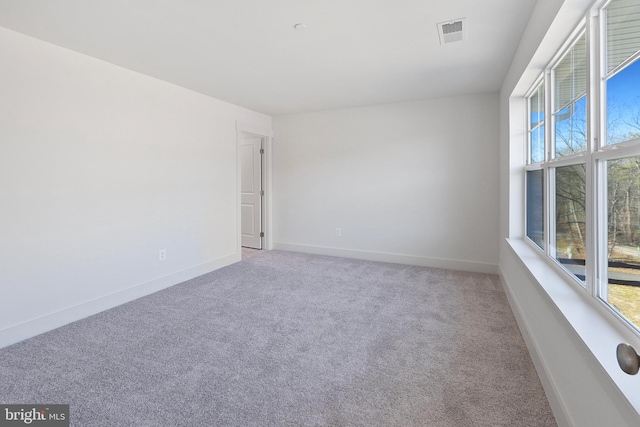1333 German Driveway, Hanover, MD 21076 - unfurnished room featuring plenty of natural light and carpet