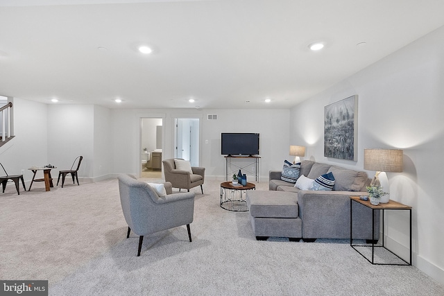 1333 German Driveway, Hanover, MD 21076 - living area with light carpet, recessed lighting, and stairs