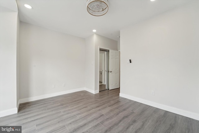 unfurnished room with light hardwood / wood-style floors