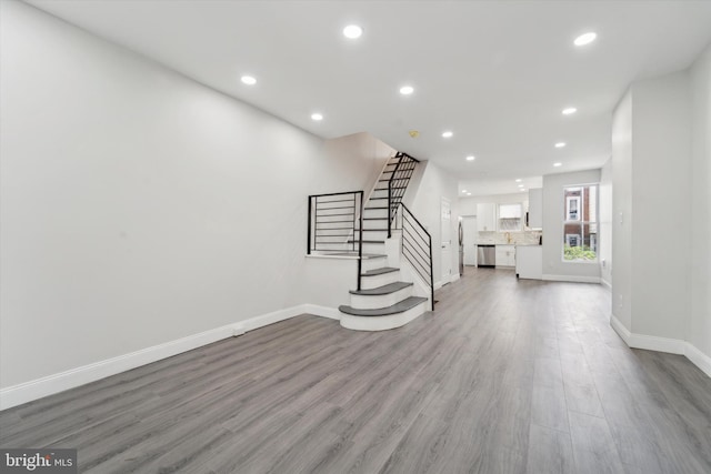 interior space with hardwood / wood-style flooring