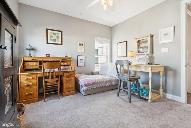 bedroom with baseboards and carpet floors