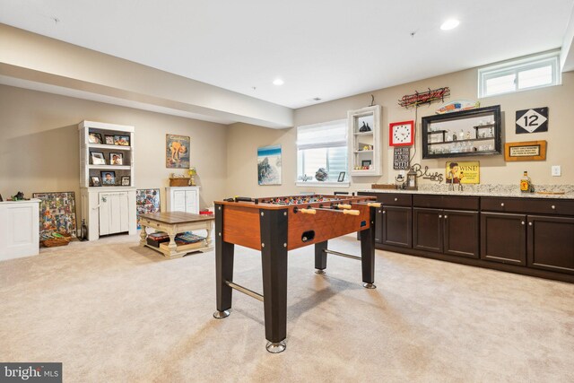 game room featuring recessed lighting and light carpet