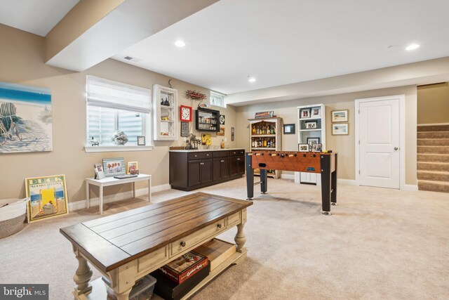 game room with recessed lighting, visible vents, light colored carpet, and indoor bar