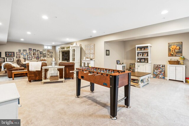 game room featuring recessed lighting and light carpet