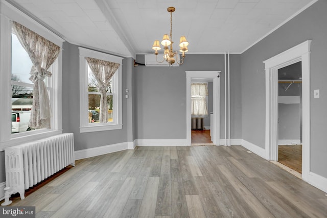 500 Dorsey Ave, Essex, MD 21221 - unfurnished dining area featuring radiator heating unit, a chandelier, crown molding, and wood finished floors