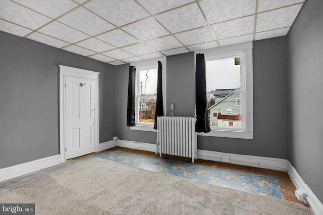 500 Dorsey Ave, Essex, MD 21221 - spare room featuring radiator heating unit and healthy amount of natural light