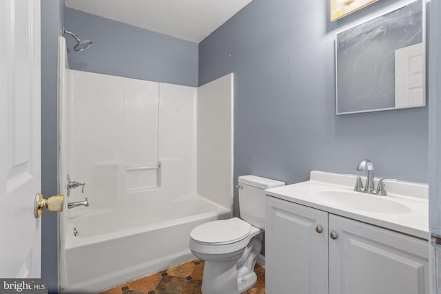 bathroom with vanity, toilet, and washtub / shower combination