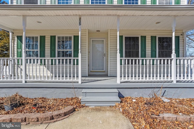 doorway to property with a porch