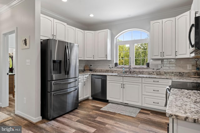 kitchen featuring white cabinets, black dishwasher, stainless steel fridge with ice dispenser, and sink